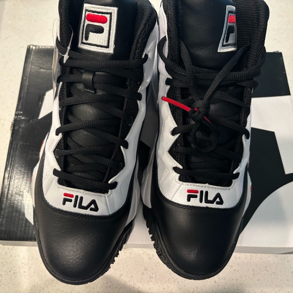 Men fila sneakers multi-color, white, black and red. Never worn with tags.